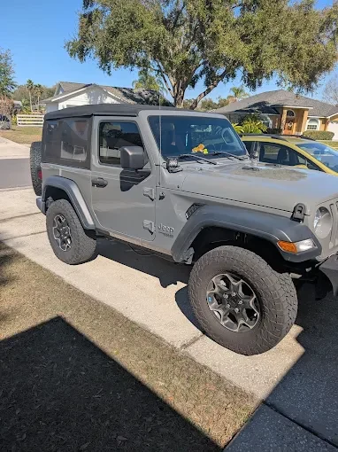 Gray Jeep with clean exterior and wheels