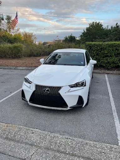 White Lexus sedan photographed outdoors